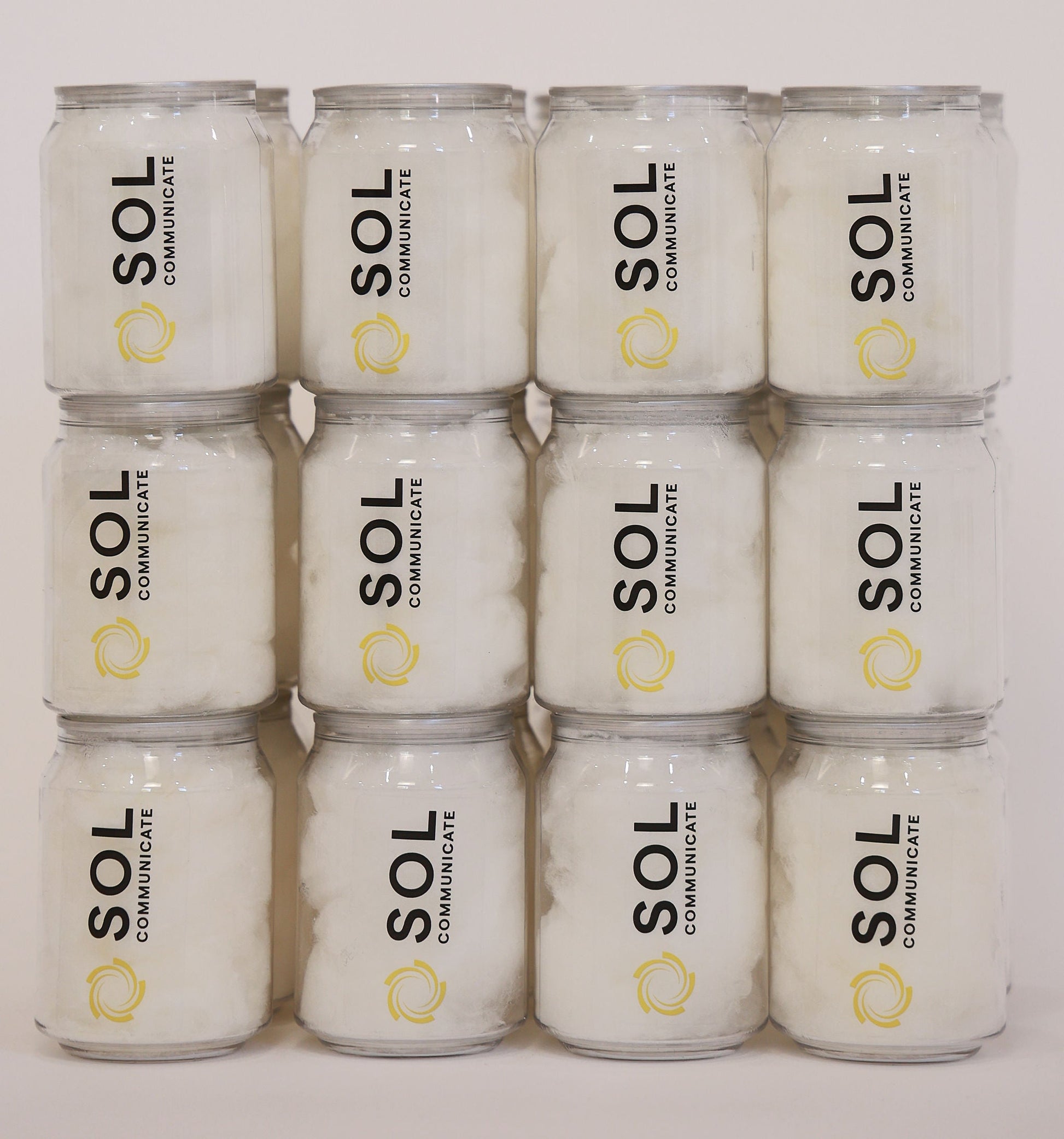 Stack of branded fairy floss cans with business logo