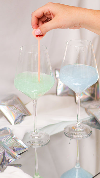 Blue and green glitter drink garnish