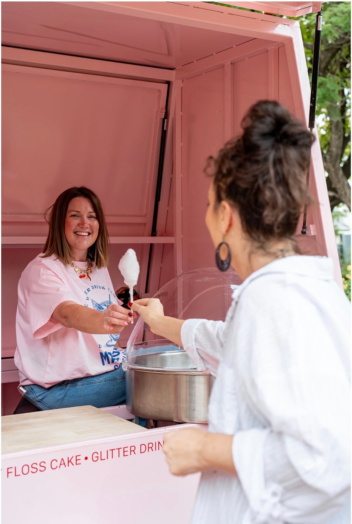 Serving fairy floss from living spinning trailer and machine