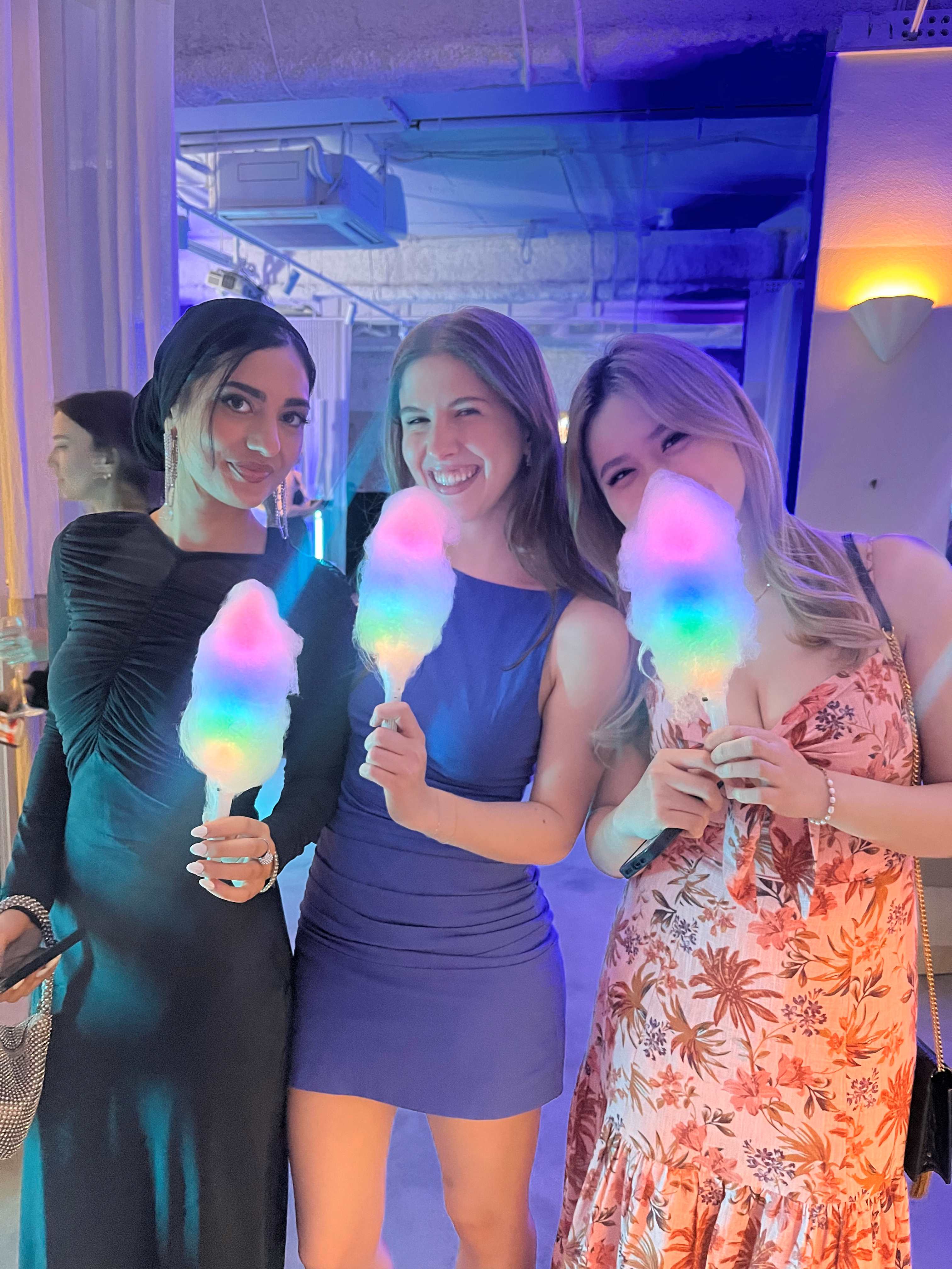 Fairy floss spun on light up stick on the dance floor at event